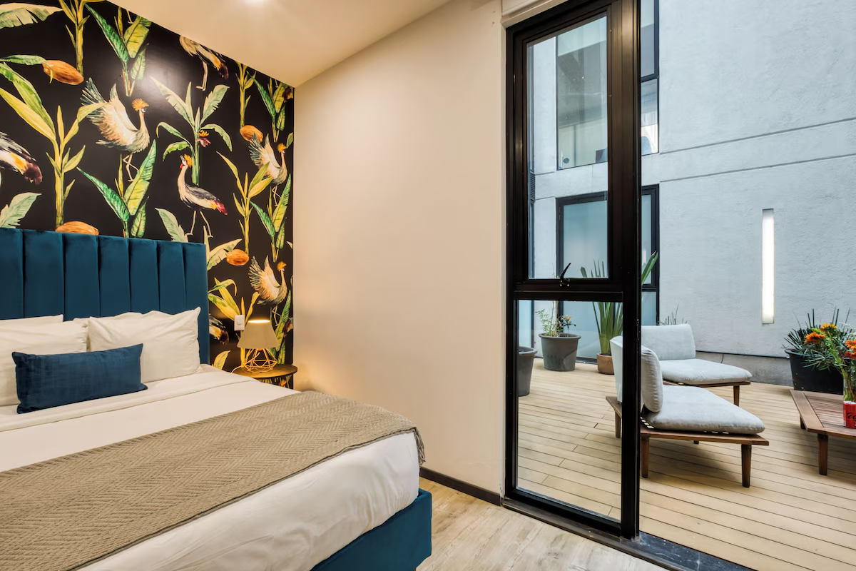 Departamento Clásico con cama king y diseño minimalista oscuro